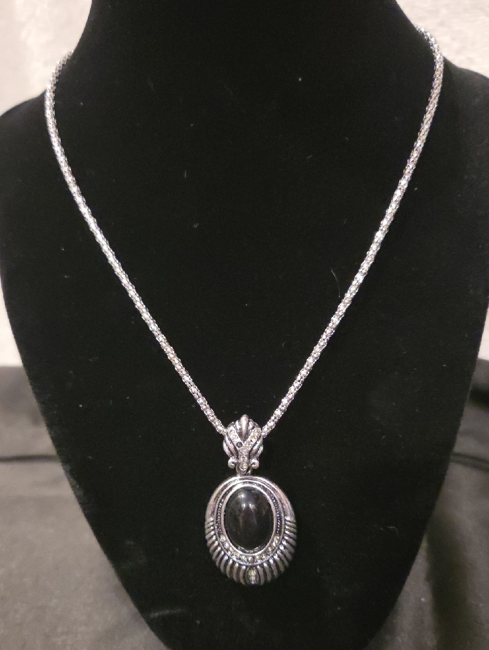 SILVERTONE PENDANT WITH BLACK STONE CENTER